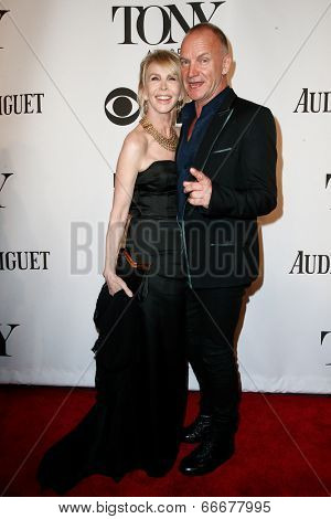 NEW YORK-JUNE 8: Recording artist Sting (R) and wife Trudie Styler attend American Theatre Wing's 68th Annual Tony Awards at Radio City Music Hall on June 8, 2014 in New York City.