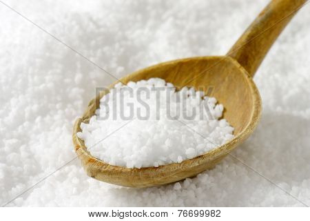 coarse grained sea salt with the wooden teaspoon
