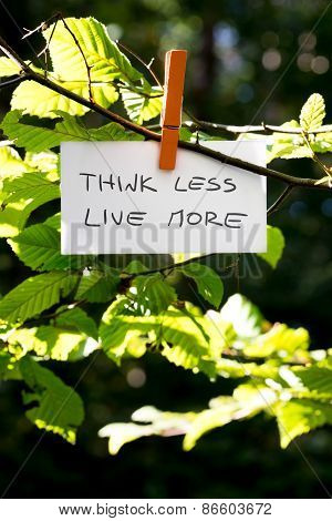 Think Less Live More Inspirational Message Written On A White Card