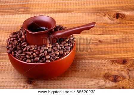 Coffee Beans In Bowl With Finjan