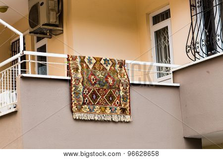 carpet   hanging on balcony