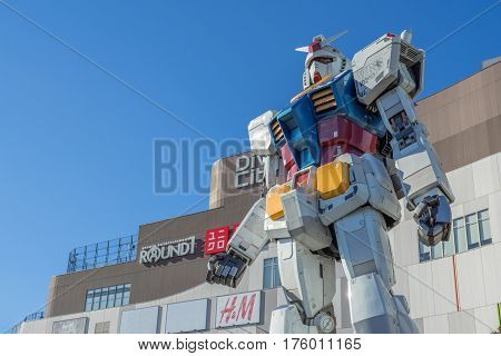 ODAIBA - TOKYO, JAPAN - 17 February 2017: Statue of Gundam at DivercCity Tokyo Plaza in Tokyo. It is ratio 1:1 of Gundam Statue Performances a the biggest Gundam in the world.