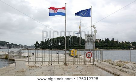 ROVINJ CROATIA - OCTOBER 15: Water Border Crossing in Rovinj on OCTOBER 15 2014. Port Dock With Border Line in Rovinj Croatia.