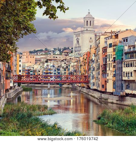 historical jewish quarter in Girona with Eiffel Bridge at sunrise, Barcelona, Spain, Catalonia
