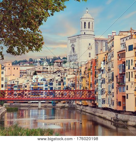 historical jewish quarter in Girona with Eiffel Bridge at sunrise, Barcelona, Spain, Catalonia