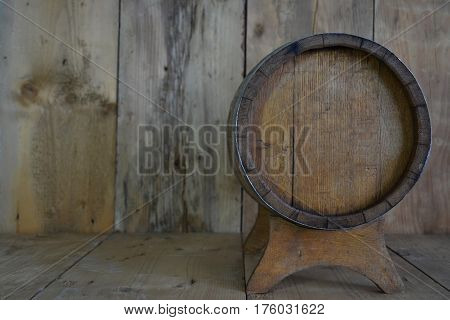 background of barrel and worn old table of wood