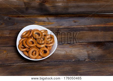 Russian Bagels, Bread In A White Plate On Wooden Background