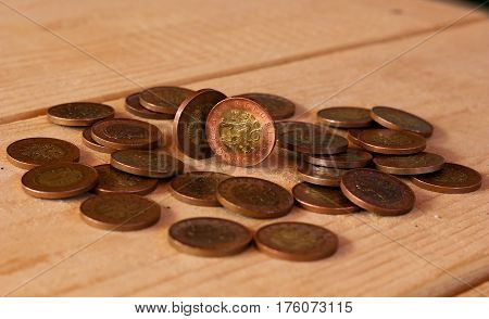 czech coins with a value of 50 crowns on wooden table