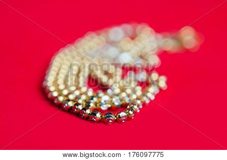 Gold Necklace 96.5 Percent Thai Gold Grade With Gold Heart Pendant Isolated On Red Flannel Cloth Bac
