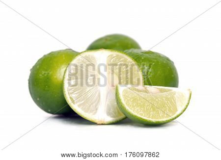 Lemon Or Lime Fruit With Half Cross Section And Partial Section Isolated On White