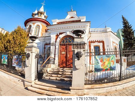 SAMARA RUSSIA - MARCH 11 2017: Fisheye view of the Klodt Mansion in sunny day in Samara Russia. Architectural landmark in the city