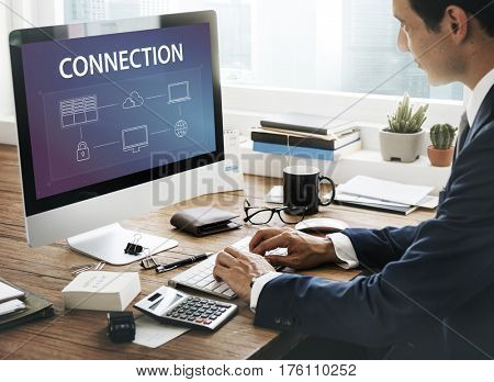 Man using computer cloud network graphic overlay