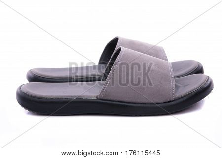 Close up of grey leather sandal on white background solated.