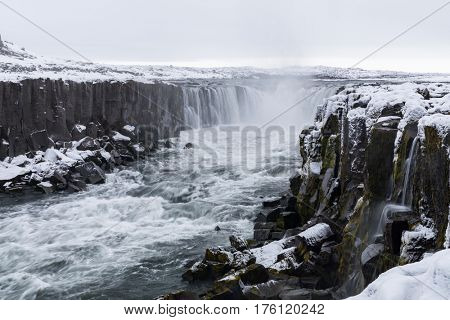Iceland Selfoss Waterfall in winter with snow