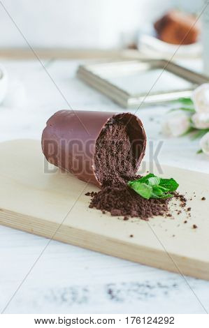Chocolate Dessert In The Form Of A Fallen Flower Pot