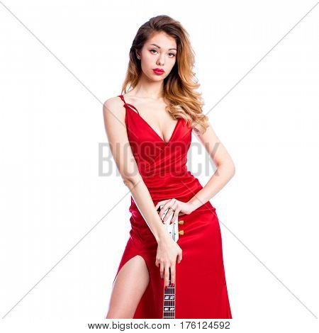 Podolsk, Russia - February 22, 2017: Young brunette Woman with a vintage electric guitar Gibson es-345 1969 model year