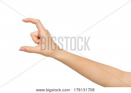Female manicured hand measuring invisible items, woman's palm making gesture while showing small amount of something on white isolated background, side view, close-up, cutout, copy space