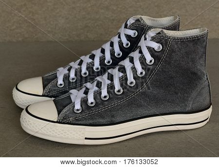 close up vintage style of sport gray sneaker shoes on white background