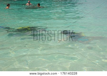 Cala Mariolu, Italy - 28 June 2013: Child discover scuba diving at Cala Mariolu beach on Sardinia, Italy