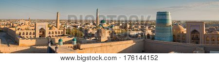 Panoramic view of the ancient fortress Ichan Kala from the observation deck at sunset. Khiva Uzbekistan