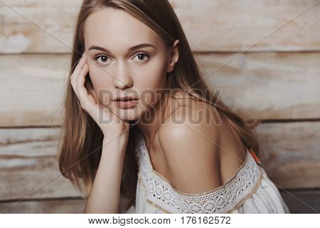 Close up fashion lifestyle portrait of young pretty woman in wooden room. Processed with VSCO f3 preset