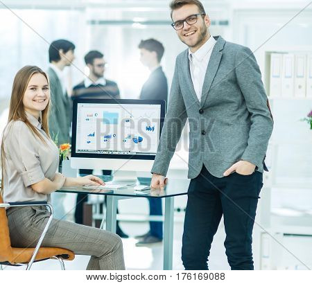 consultant in financial investments and Manager of the company in the workplace in a modern office.the photo has a empty space for your text.