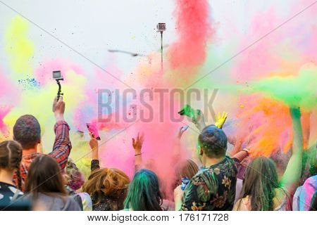 Krakow Poland 11 June 2016: Festival of Colors in Krakow. Unidentified people dancing and celebrating during the color throw Poland