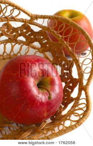 Apple In A Crib On The White Background