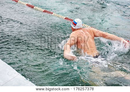 Sahyurta ,, Irkutsk Region, Russia - March 11.2017: Cup Of Baikal. Winter Swimming Competitions. But