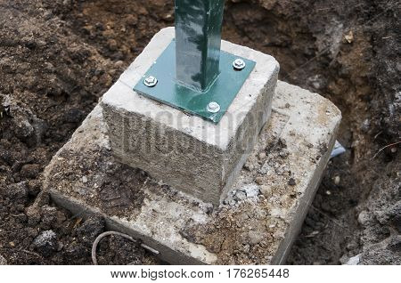 Foundation for the rebar fixing the fence in the ground