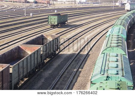 industrial view with lot of freight railway trains waggons.