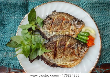 Grilled Pomfret Fish With Basil Leaf And Pickles