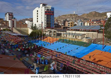 ORURO, BOLIVIA - FEBRUARY 24, 2017: Street in the mining city of Oruro that has been closed off to vehicles and lined with temporary seating in preparation for the annual Oruro Carnival.