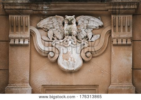 Owl as a sculptural element decorating buildings
