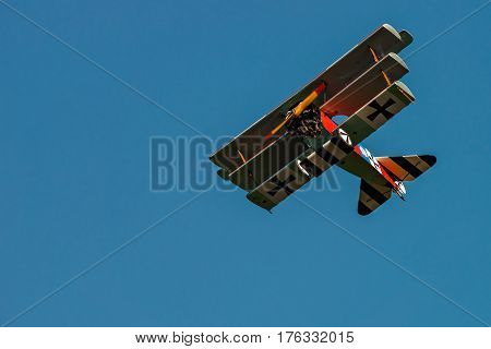 RHINEBECK NY - SEPTEMBER 25 2016: The Aerodrome Air Show Team perform a show with the World War I plane Fokker Dr-I (Reproduction) at Old Rhinebeck Aerodrome