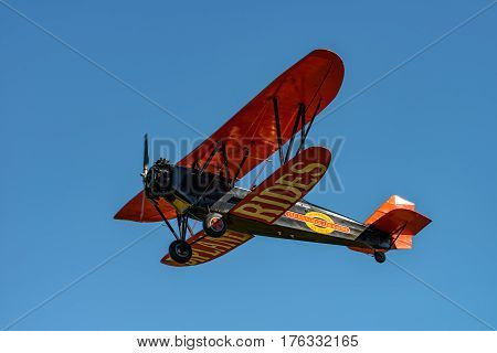 RHINEBECK NY - SEPTEMBER 25 2016: The Aerodrome Air Show Team perform a show with the Golden Age plane New Standard D-25 (Original) at Old Rhinebeck Aerodrome
