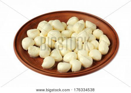 Mozzarella mini balls in a bowl isolated on white background