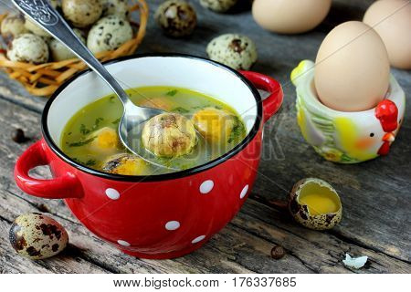 Traditional Easter soup with egg yolk in bowl