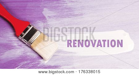 White paint brush stroke on violette half-painted wooden surface. Renovation concept