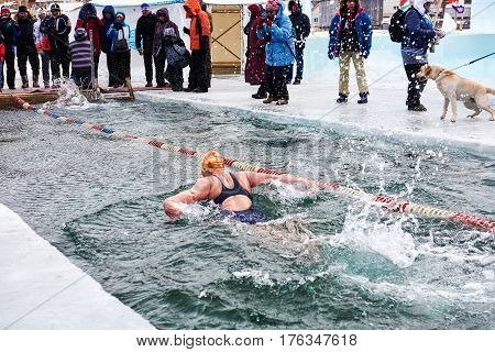 Sahyurta ,irkutsk Region, Russia - March 11.2017: Cup Of Baikal. Winter Swimming. Butterfly. Woman