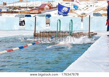 Sahyurta ,irkutsk Region, Russia - March 11.2017: Cup Of Baikal. Winter Swimming. Butterfly