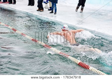 Sahyurta ,irkutsk Region, Russia - March 11.2017: Cup Of Baikal. Winter Swimming. Butterfly