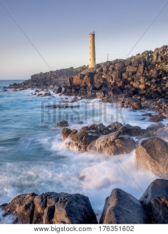 Ninini Point Lighthouse on Nawiliwili Bay in  Kaua'i' Hawai'i overlooking the ocean.