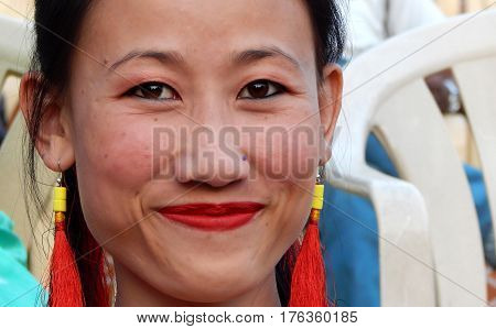 HYDERABAD,INDIA-MARCH 3:Closeup portrait of North eastern tribal woman dancer,with details of ornaments and dress in Shilparamam on March 3,2017 in Hyderabad,India