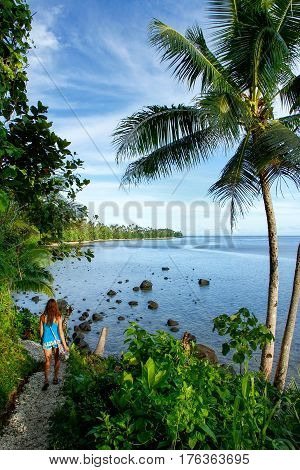 Young Woman Hiking Lavena Costal Walk On Taveuni Island, Fiji