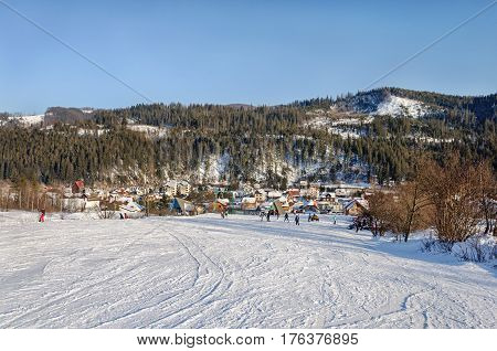 Mountain in ski resort Slavske Carpathians Ukraine. Sunny winter evening