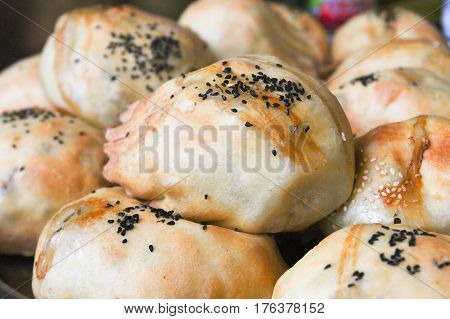 Samsa tandyrnaya as background traditional oriental dish.