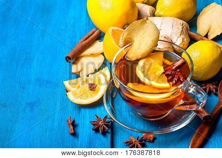 Cup Of Ginger Tea With Lemon And Honey On Dark Blue Background,