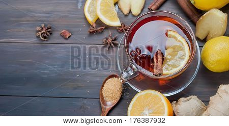 Cup Of Ginger Tea With Lemon And Honey On Dark Brown Wooden  Background