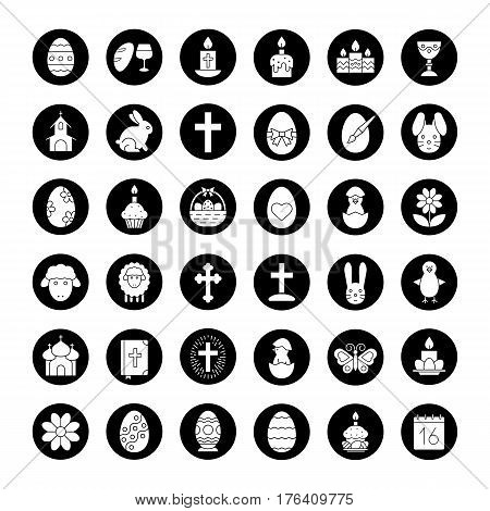 Easter icons set. Easter bunny, eggs, cake, cross, lamb, chicken, church, candles, Holy Bible, April 16, wine and bread. Vector white silhouettes illustrations in black circles